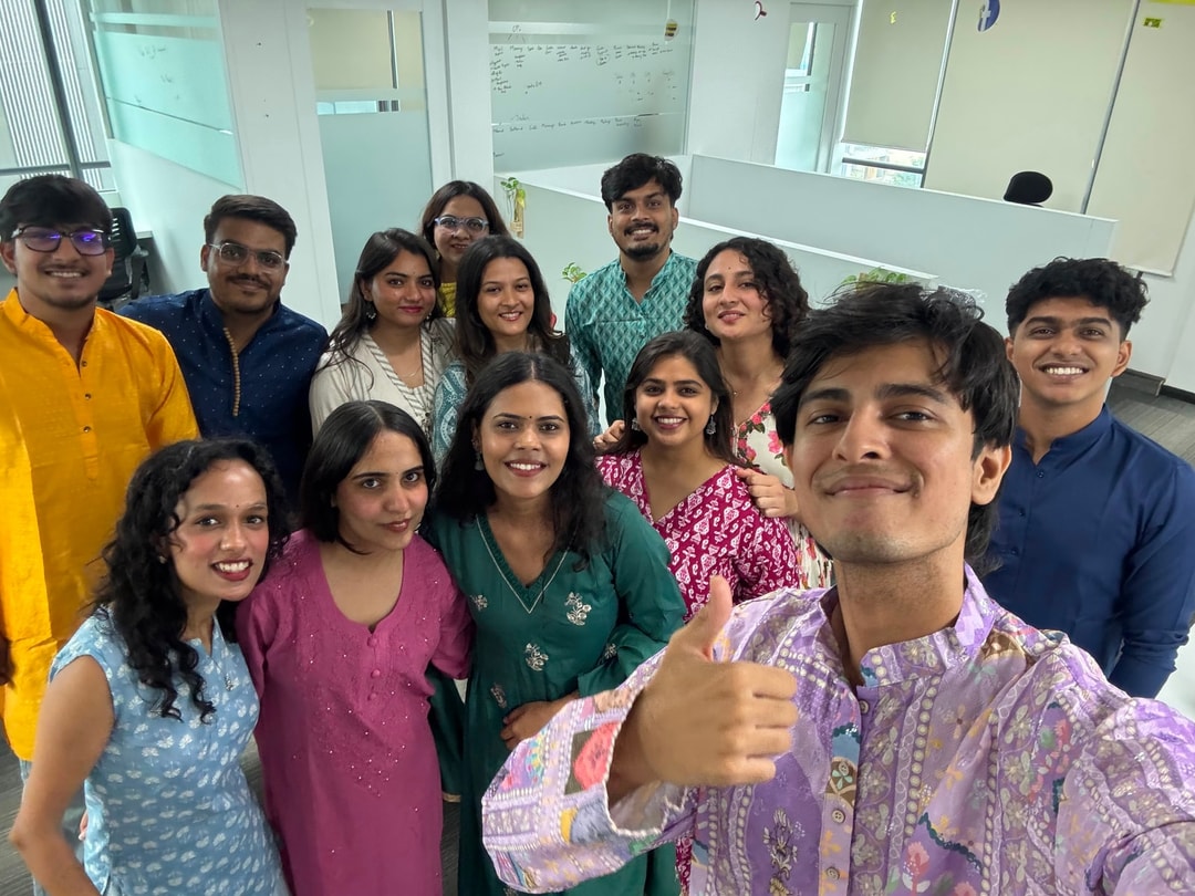 A festive group selfie of the team