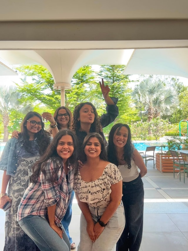 Team members together at a resort